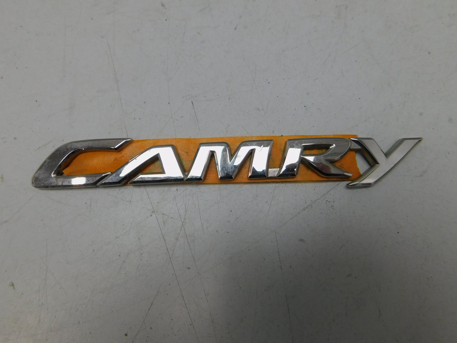 Эмблема Toyota Camry V50 2011-2018