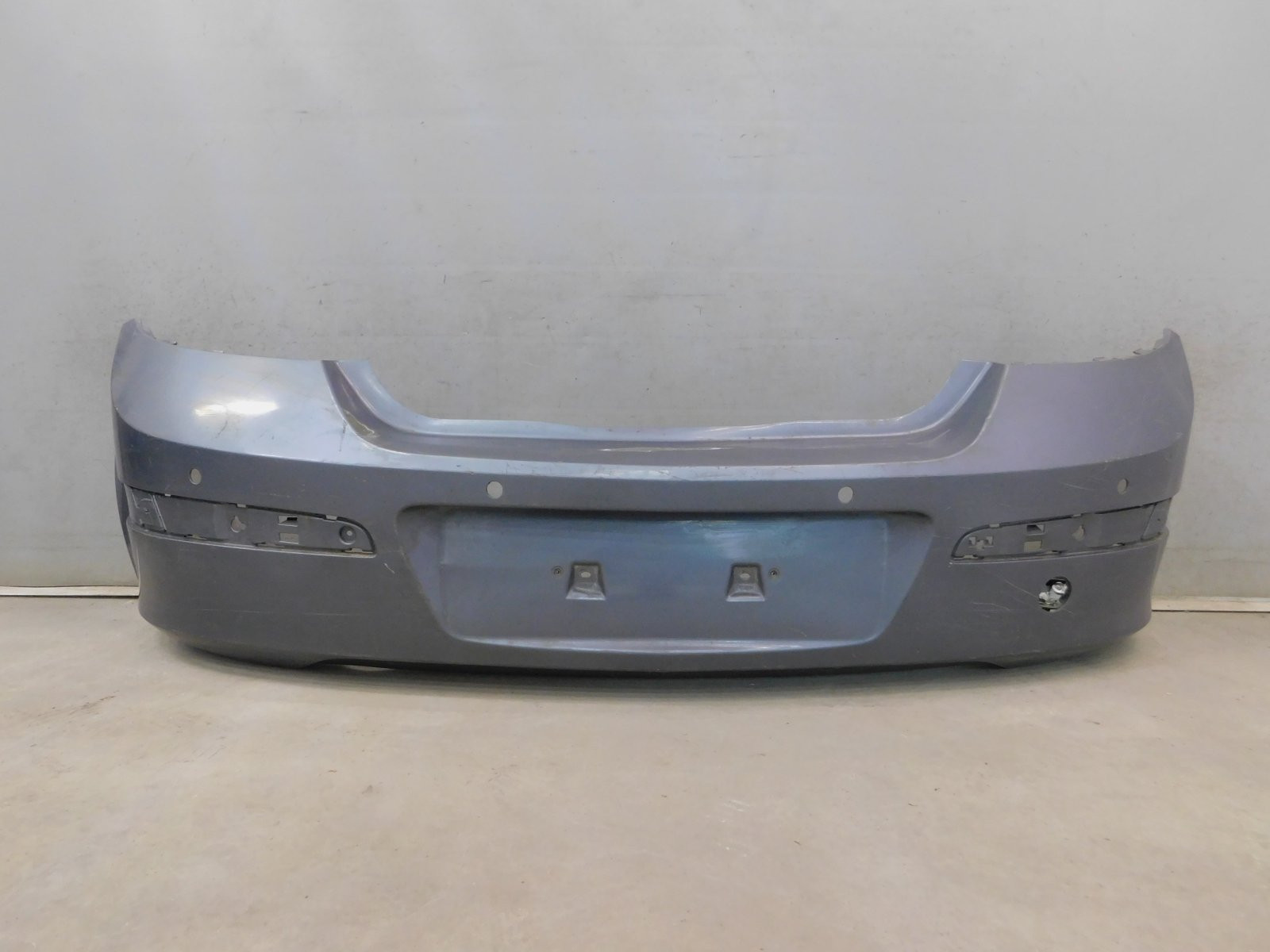 Бампер задний Opel Astra H 2004>